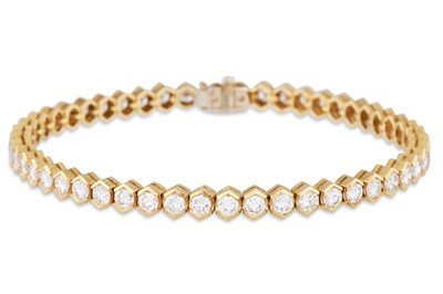 Lot 126 - A DIAMOND LINE BRACELET, the brilliant cut...