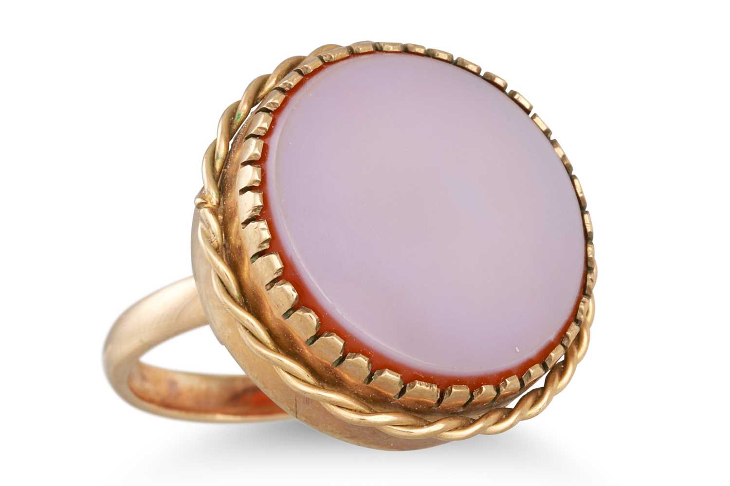 Lot 33 - A VINTAGE RING, set with carnelian in 9ct gold....