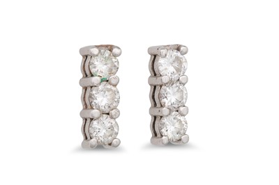 Lot 65 - A PAIR OF THREE STONE DIAMOND EARRINGS, in...