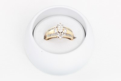 Lot 69 - A DIAMOND CLUSTER RING, the marquise cut...