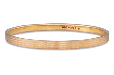 Lot 104 - A 9CT GOLD BANGLE, hallmarked Birmingham 1924,...