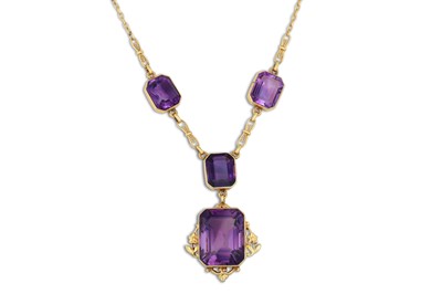 Lot 125 - AN AMETHYST PENDANT, comprising three...