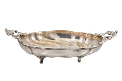 Lot 534 - AN ANTIQUE GERMAN TWIN HANDLED BREAD BASKET, (....