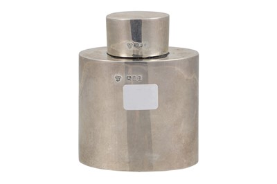 Lot 536 - A GEORGE V SILVER TEA CADDY, of plain oval...