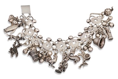 Lot 120 - A LATE VICTORIAN SILVER CHARM BRACELET,...