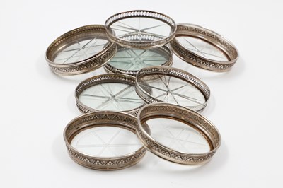 Lot 254 - A COLLECTION OF SILVER PLATED ON CUT GLASS...