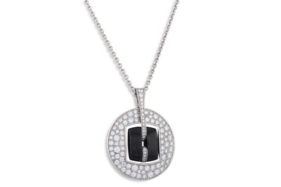 Lot 182 - A CHANEL DIAMOND AND BLACK CERAMIC CIRCULAR...