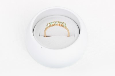 Lot 20 - A TOURMALINE FIVE STONE RING, mounted in 9ct...