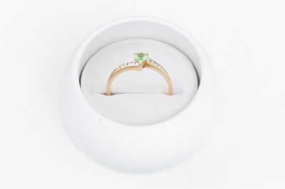 Lot 21 - A TOURMALINE DRESS RING, mounted in 9ct yellow...