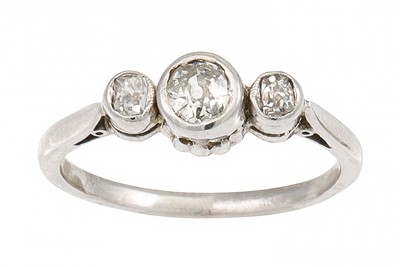 Lot 451 - A THREE STONE DIAMOND RING, the old cut...