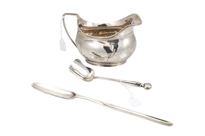 Lot 505 - A GEORGE III SILVER MARROW SCOOP, London 1761,...