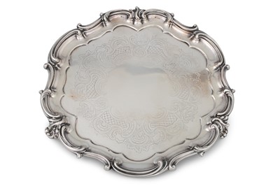 Lot 244 - A LATE VICTORIAN SILVER PLATED SALVER,...