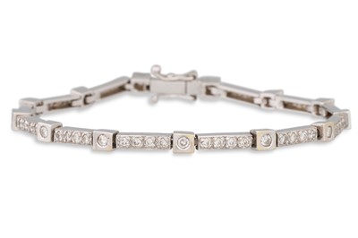 Lot 95 - A DIAMOND BRACELET, mounted in 18ct white gold....