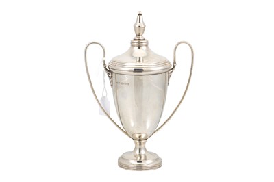 Lot 507 - A PRE-WAR SILVER TWIN HANDLED CUP & COVER OF...