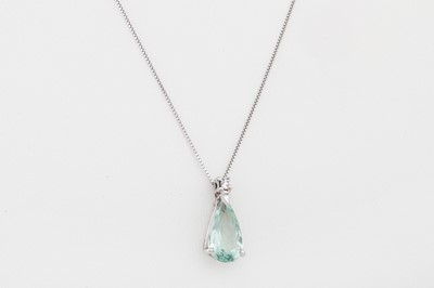 Lot 54 - AN AQUAMARINE AND DIAMOND PENDANT, on a 18ct...