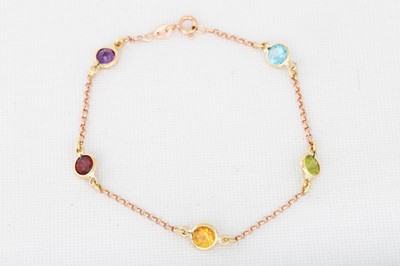 Lot 139 - A CITRINE AND AMETHYST BRACELET, gold mounts