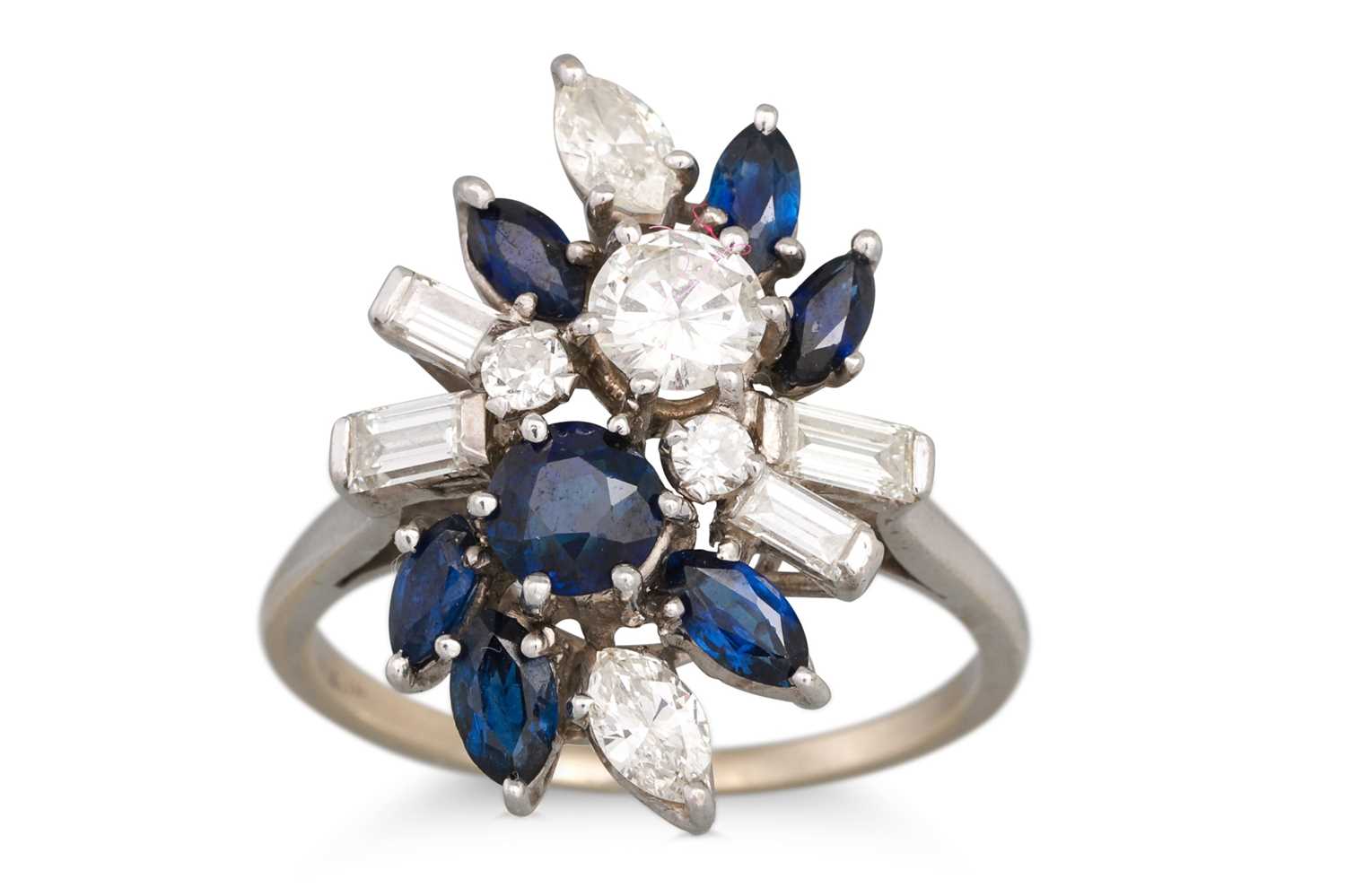 Lot 27 - A DIAMOND AND SAPPHIRE CLUSTER RING, mounted...