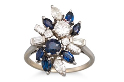 Lot 27 - A DIAMOND AND SAPPHIRE CLUSTER RING, mounted...