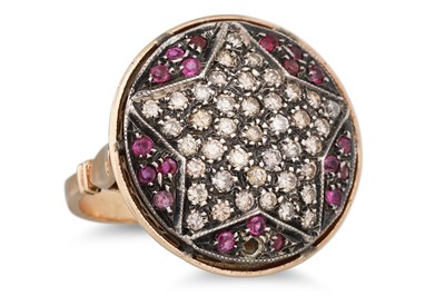 Lot 273 - A DIAMOND AND RUBY DRESS RING, pavé set star...