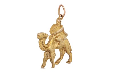 Lot 2 - A 10CT YELLOW GOLD PENDANT, depicting a figure...