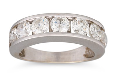 Lot 173 - A DIAMOND HALF ETERNITY RING, the round...