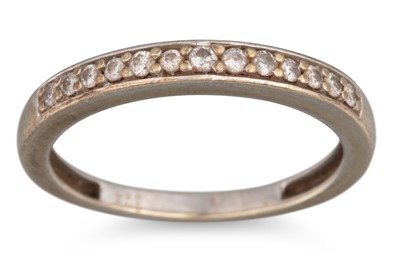 Lot 40 - A DIAMOND HALF HOOP ETERNITY RING, the round...