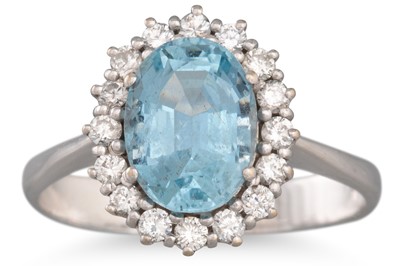 Lot 90 - AN AQUAMARINE AND DIAMOND RING, the oval...