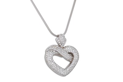 Lot 287 - A DIAMOND HEART SHAPED PENDANT, pavé set in...