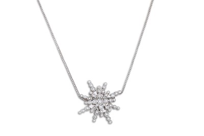 Lot 288 - A DIAMOND PENDANT, modelled as a snowflake,...