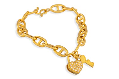Lot 53 - A 22CT GOLD BRACELET, suspending charms, 8 g