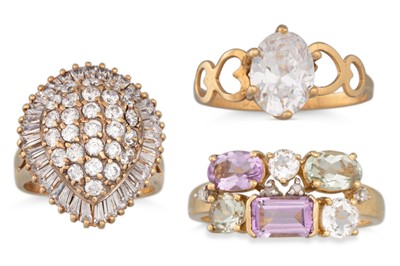 Lot 64 - THREE 9CT GOLD RINGS, 12.2 g. Sizes ranging...