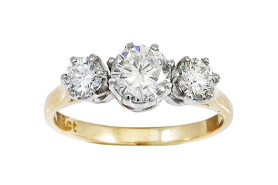 Lot 3 - A THREE STONE DIAMOND RING, the brilliant cut...