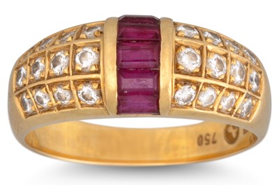Lot 44 - A RUBY AND DIAMOND BOMBÉ RING, the channel set...