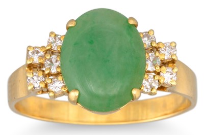 Lot 332 - A JADE AND DIAMOND RING, the cabochon jade to...