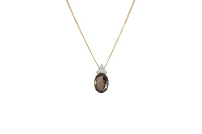 Lot 151 - A SMOKEY QUARTZ AND DIAMOND PENDANT, mounted...