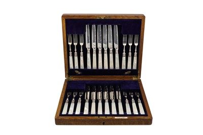 Lot 567 - AN EDWARDIAN OAK CASED SET OF FRUIT KNIFES &...