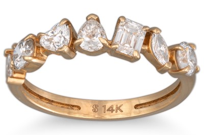 Lot 226 - A DIAMOND HALF ETERNITY RING, set with...
