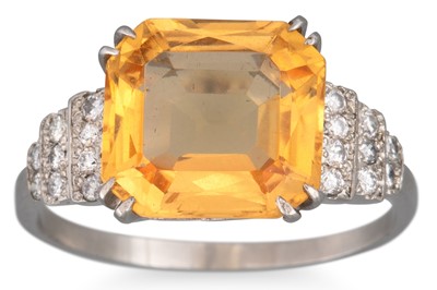 Lot 227 - A TOPAZ AND DIAMOND RING, the rectangular...