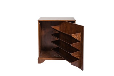 Lot 161 - A MODERN RECTANGULAR OAK SHOE CABINET the door...