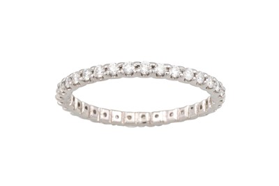 Lot 291 - A DIAMOND ETERNITY RING, the brilliant cut...