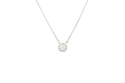 Lot 299 - A DIAMOND 'HALO' CLUSTER PENDANT, the...