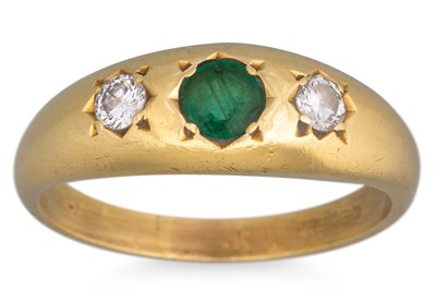 Lot 51 - AN EMERALD AND DIAMOND RING, mounted in 18ct...