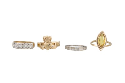 Lot 34 - A GROUP OF FOUR GOLD RINGS, comprising a four...
