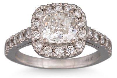 Lot 353 - A DIAMOND CLUSTER RING, the cushion cut...