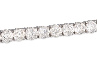 Lot 84 - A DIAMOND LINE BRACELET, the brilliant cut...