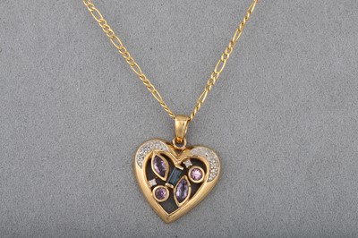 Lot 9 - A 9CT GOLD GEM-SET PENDANT, chain 24"