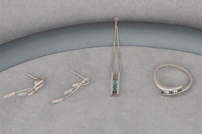 Lot 12 - A TOPAZ SET PENDANT, together with a ring &...