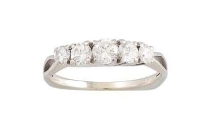 Lot 105 - A FIVE STONE DIAMOND RING, the brilliant cut...