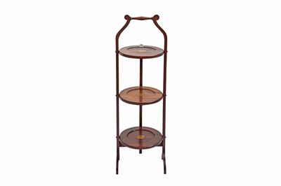 Lot 168 - AN EDWARDIAN INLAID MAHOGANY THREE-TIERED CAKE...