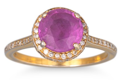 Lot 2 - A PINK SAPPHIRE AND DIAMOND SET RING, mounted...